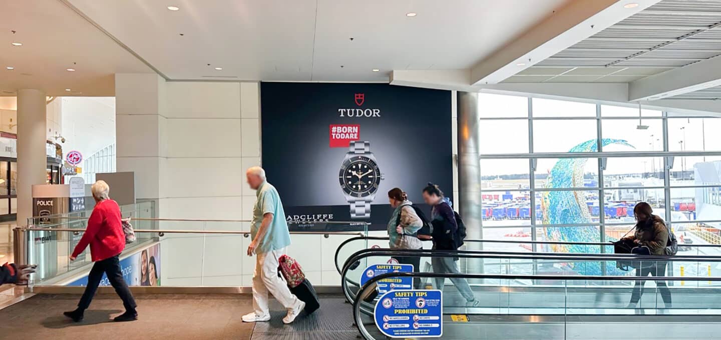 Baltimore, BWI airport tension-fabric display, Baltimore, real DOOH inventory bookable by the hour on Blindspot