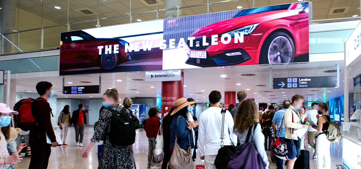 Josep Tarradellas Barcelona-El Prat Airport, Departures hall · digital pillar network, real DOOH inventory bookable by the hour on Blindspot