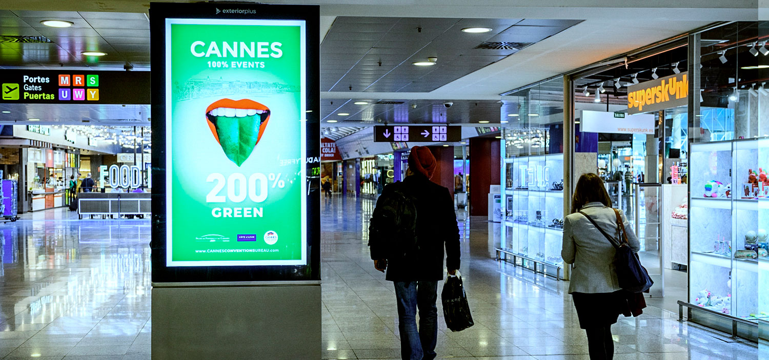 Josep Tarradellas Barcelona-El Prat Airport, Security checkpoint · suspended LED, real DOOH inventory bookable by the hour on Blindspot