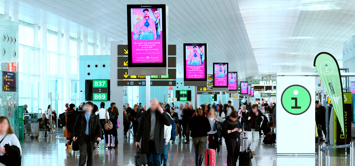 Josep Tarradellas Barcelona-El Prat Airport, Gate concourse · holdroom screens, real DOOH inventory bookable by the hour on Blindspot