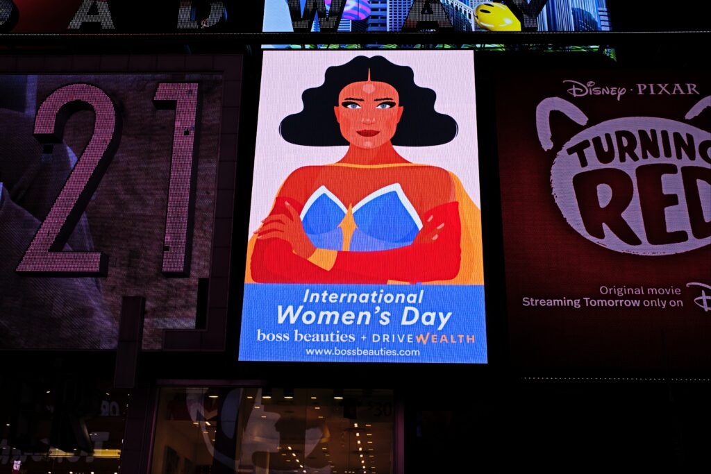 Boss Beauties International Women's Day creative on the Sunglass Hut digital billboard in Times Square, New York