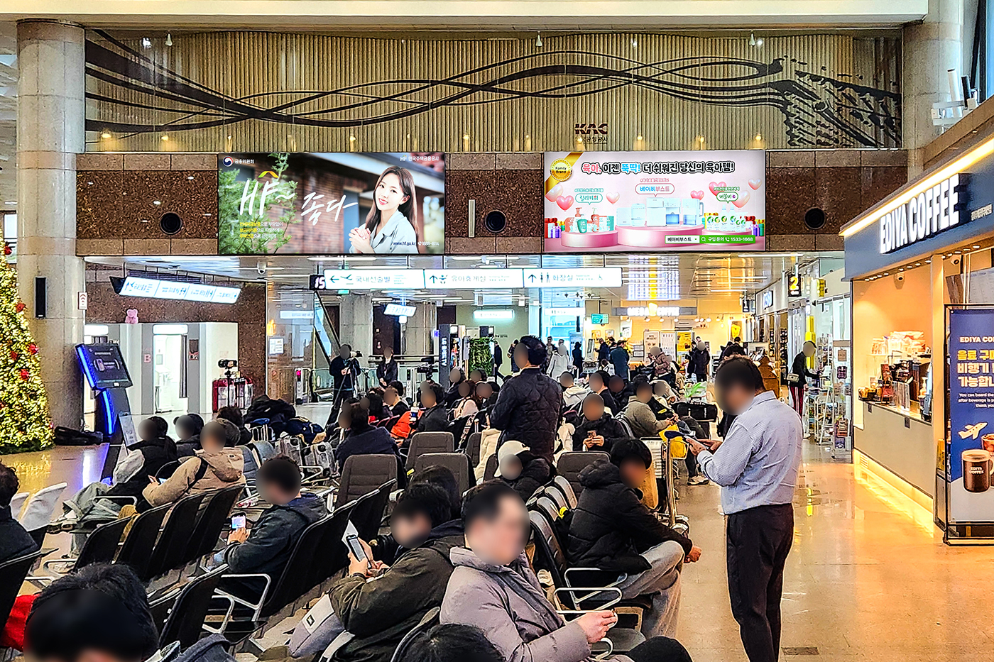 Gimhae International Airport, Gate concourse · holdroom screens, real DOOH inventory bookable by the hour on Blindspot