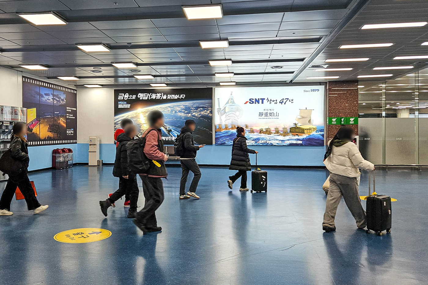 Gimhae International Airport, Light Rail and bus stands · transit LED, real DOOH inventory bookable by the hour on Blindspot