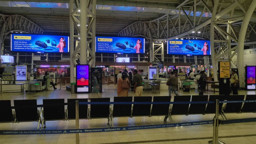Chennai, Chennai International Airport arrivals screen - airport digital screen, real DOOH inventory bookable by the hour on Blindspot