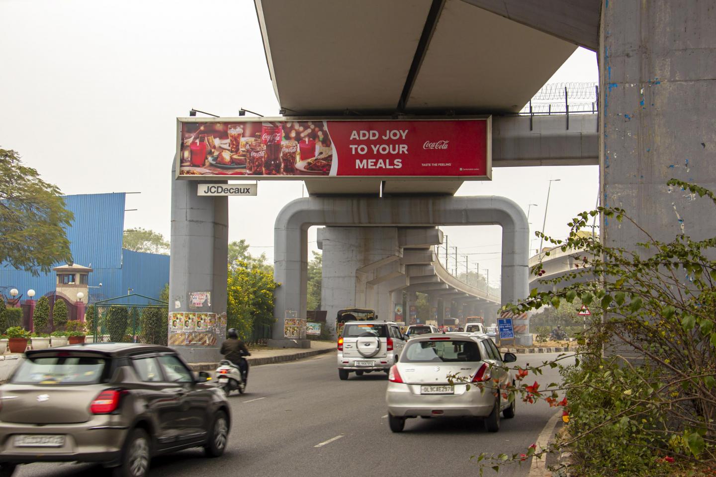 Delhi, Coca-Cola arrival gantry, Delhi, real DOOH inventory bookable by the hour on Blindspot