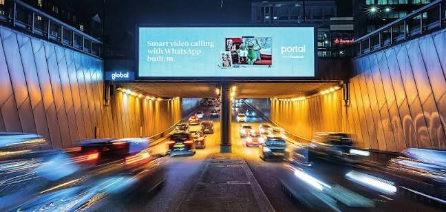 Euston Road Underpass digital billboard screens lighting an enclosed London traffic corridor