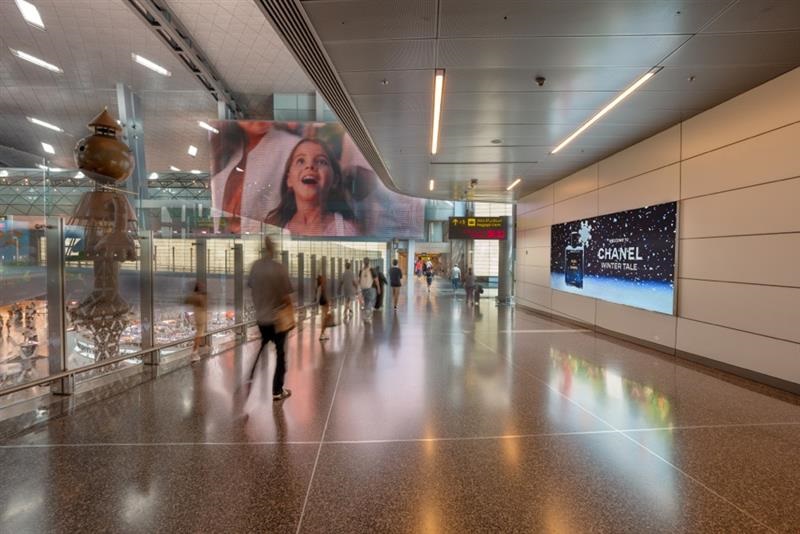 Doha Hamad Airport, Transit media mesh, real DOOH inventory bookable by the hour on Blindspot