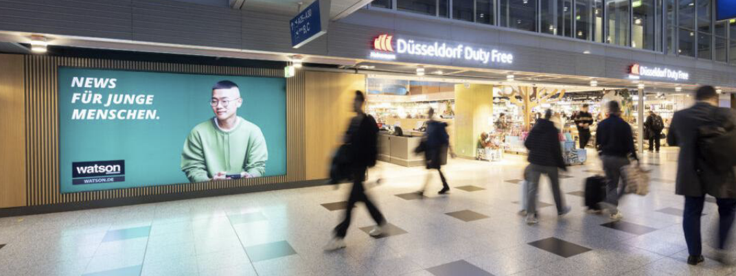 Dusseldorf, Dusseldorf transit corridor display - digital out-of-home screen, real DOOH inventory bookable by the hour on Blindspot