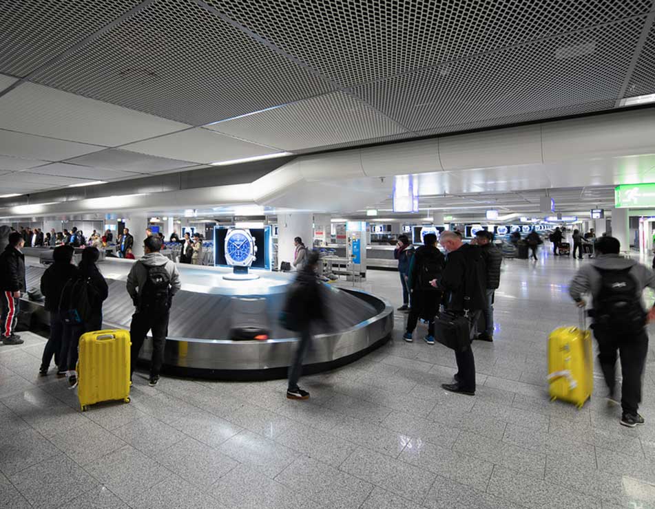Frankfurt Airport, Security checkpoint · suspended LED, real DOOH inventory bookable by the hour on Blindspot