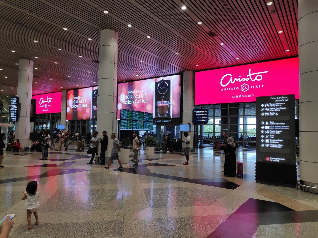 Kuala Lumpur Airport, large-format DOOH inventory bookable by the hour on Blindspot