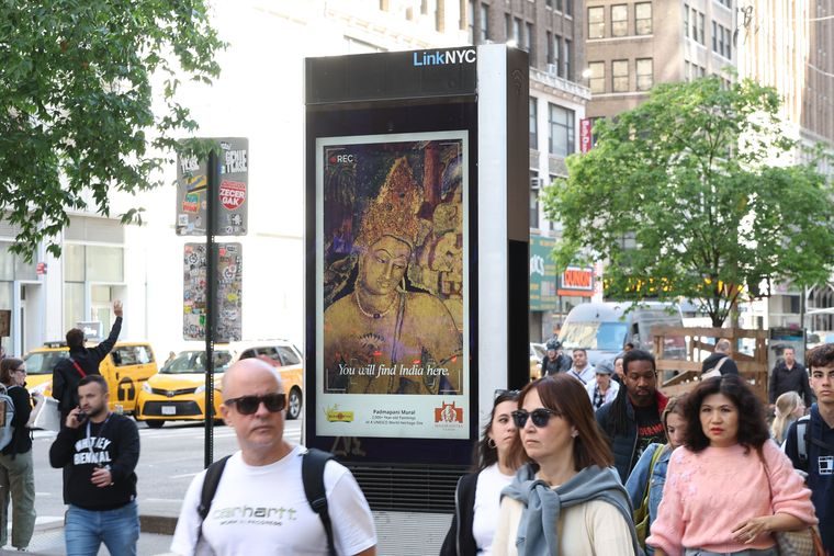 Visit Maharashtra creative on LinkNYC street screens in New York with pedestrians passing