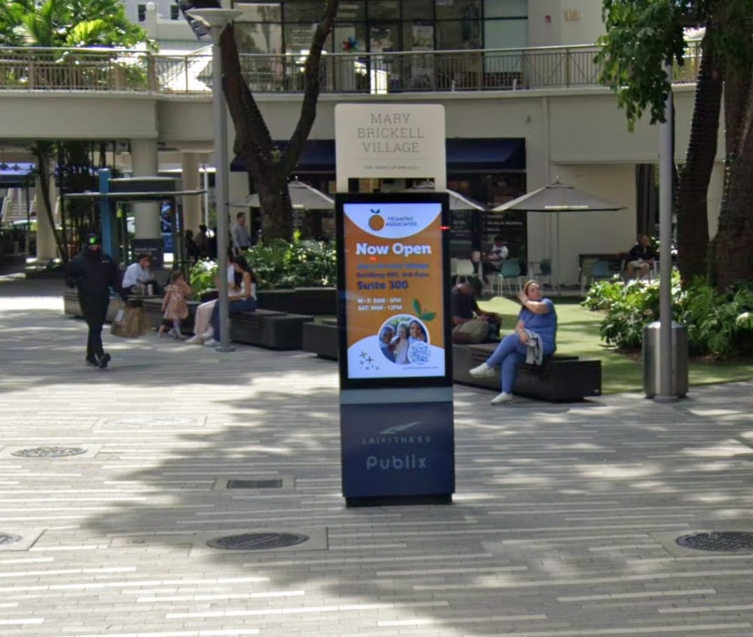 Miami billboard at 909 Brickell Plaza, bookable by the hour on Blindspot