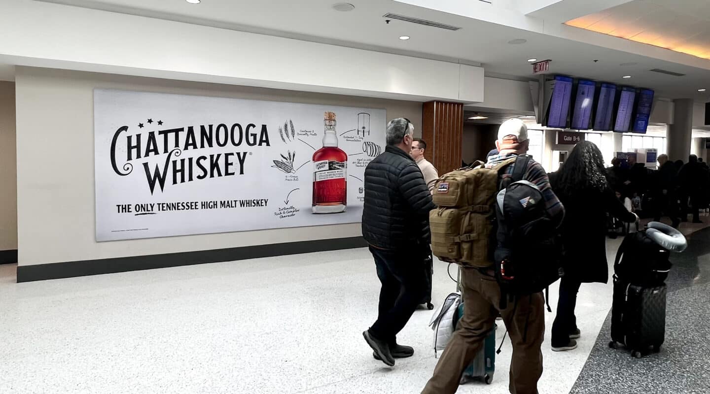 Nashville, Tension-fabric display, BNA Concourse B, real DOOH inventory bookable by the hour on Blindspot