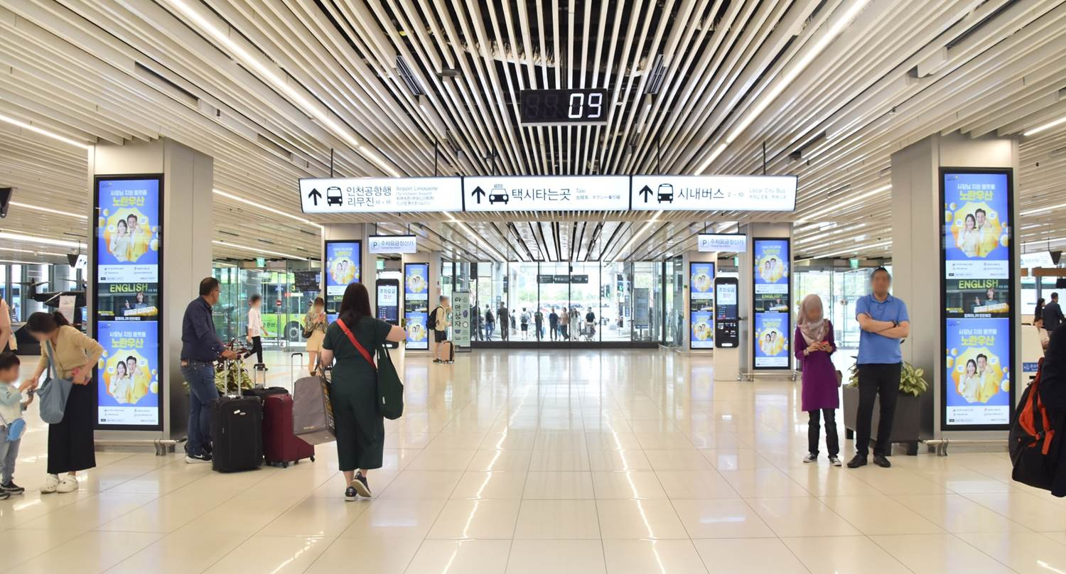 Gimpo International Airport, Security checkpoint · suspended LED, real DOOH inventory bookable by the hour on Blindspot
