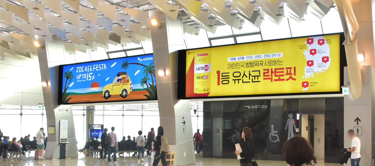 Gimpo International Airport, Duty-free · premium lightbox, real DOOH inventory bookable by the hour on Blindspot