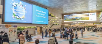 Singapore Changi, Changi T2 immigration lightbox media, real DOOH inventory bookable by the hour on Blindspot