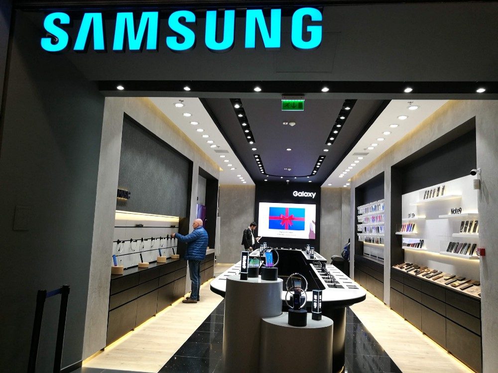 Interior of the Samsung Experience Store in Baneasa Shopping City, Bucharest, with the Galaxy wall and in-store display screens