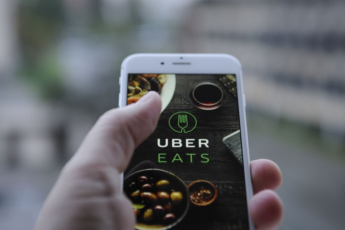 Uber Eats contextual DOOH campaign on a city street screen