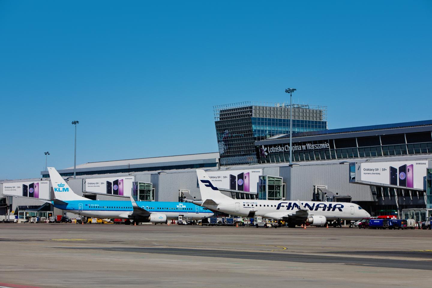 Warsaw Chopin Airport, Security checkpoint · suspended LED, real DOOH inventory bookable by the hour on Blindspot