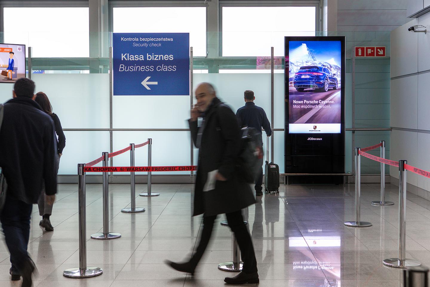 Warsaw Chopin Airport, Duty-free · premium lightbox, real DOOH inventory bookable by the hour on Blindspot
