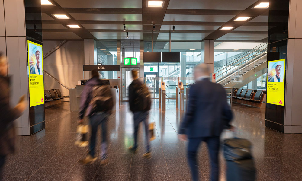Zurich Airport, Duty-free · premium lightbox, real DOOH inventory bookable by the hour on Blindspot