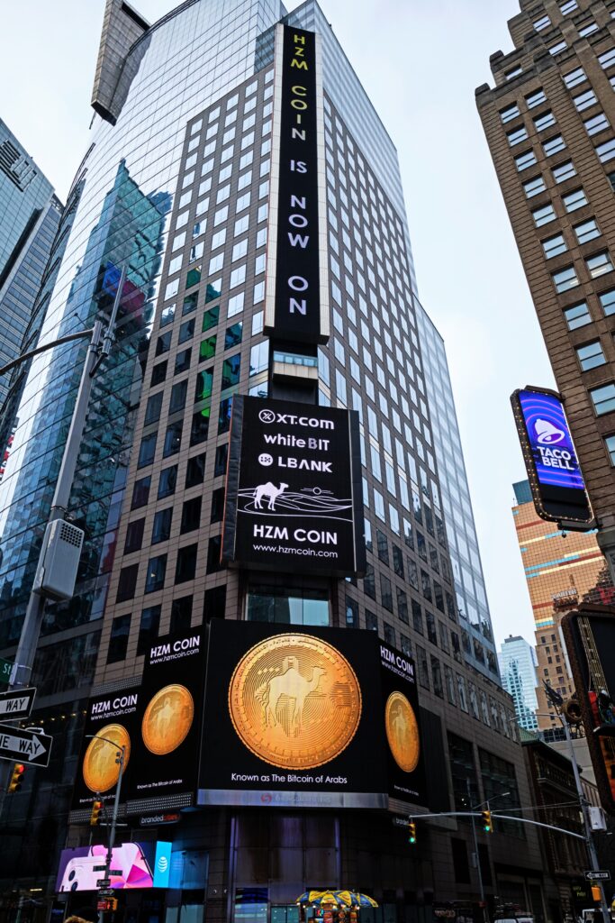 XZM Coin ad on Thomson Reuters billboard with Blindspot